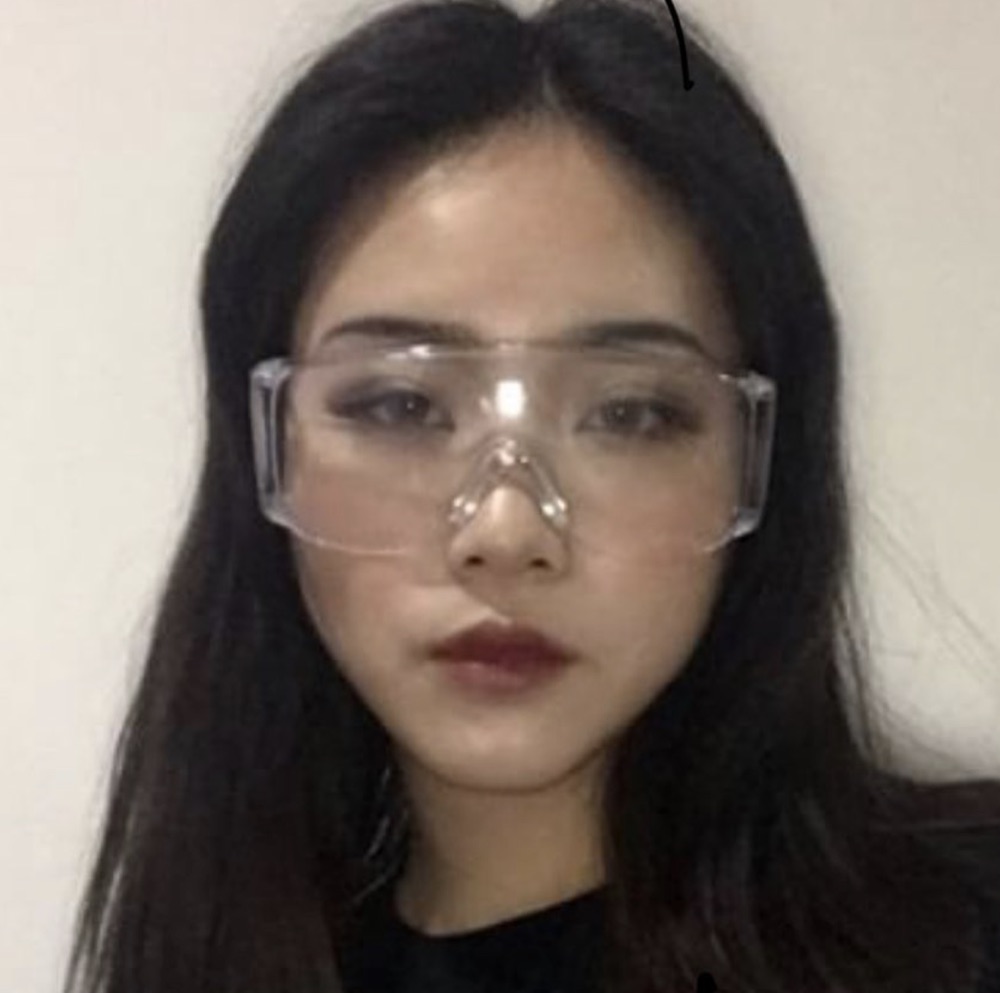 Archive portrait with clear science safety goggles.