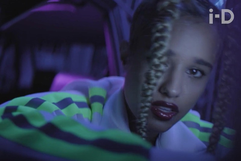 i-D film still with Tommy Genesis wearing a neon-striped Brashy piece.